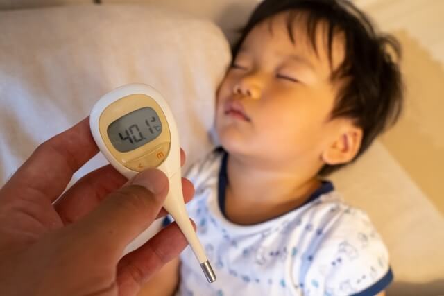 具合の悪い子供